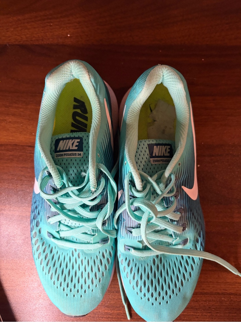 Nike Women's Teal Athletic Running Shoes with Pink Swoosh